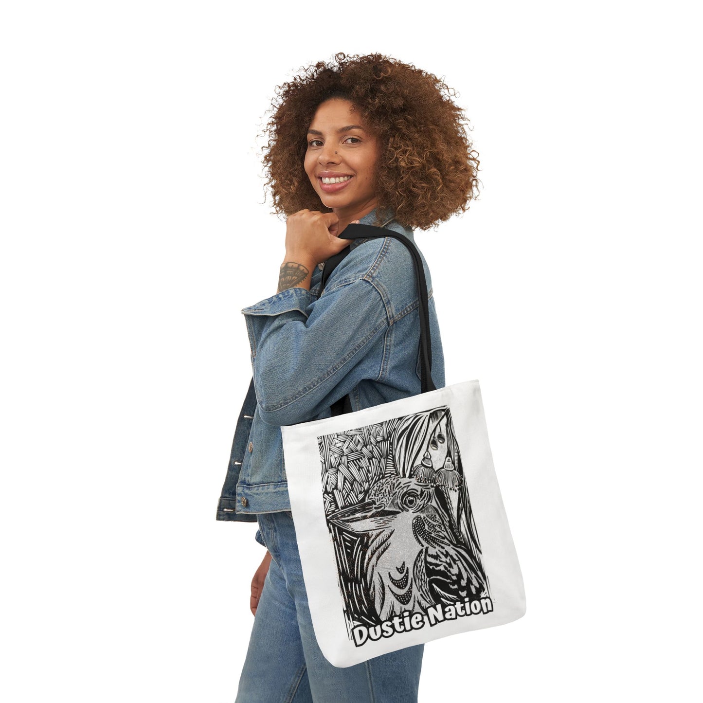 woman modelling a durable tote bag with custom artwork of a Kookaburra on a white tote bag with black handle