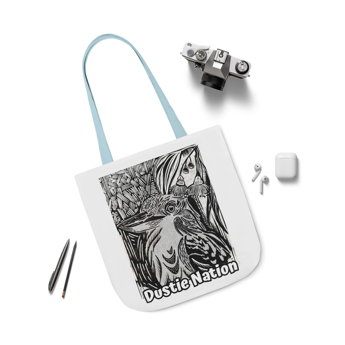 Durable tote bag with custom artwork of a Kookaburra on a white tote bag with blue handle