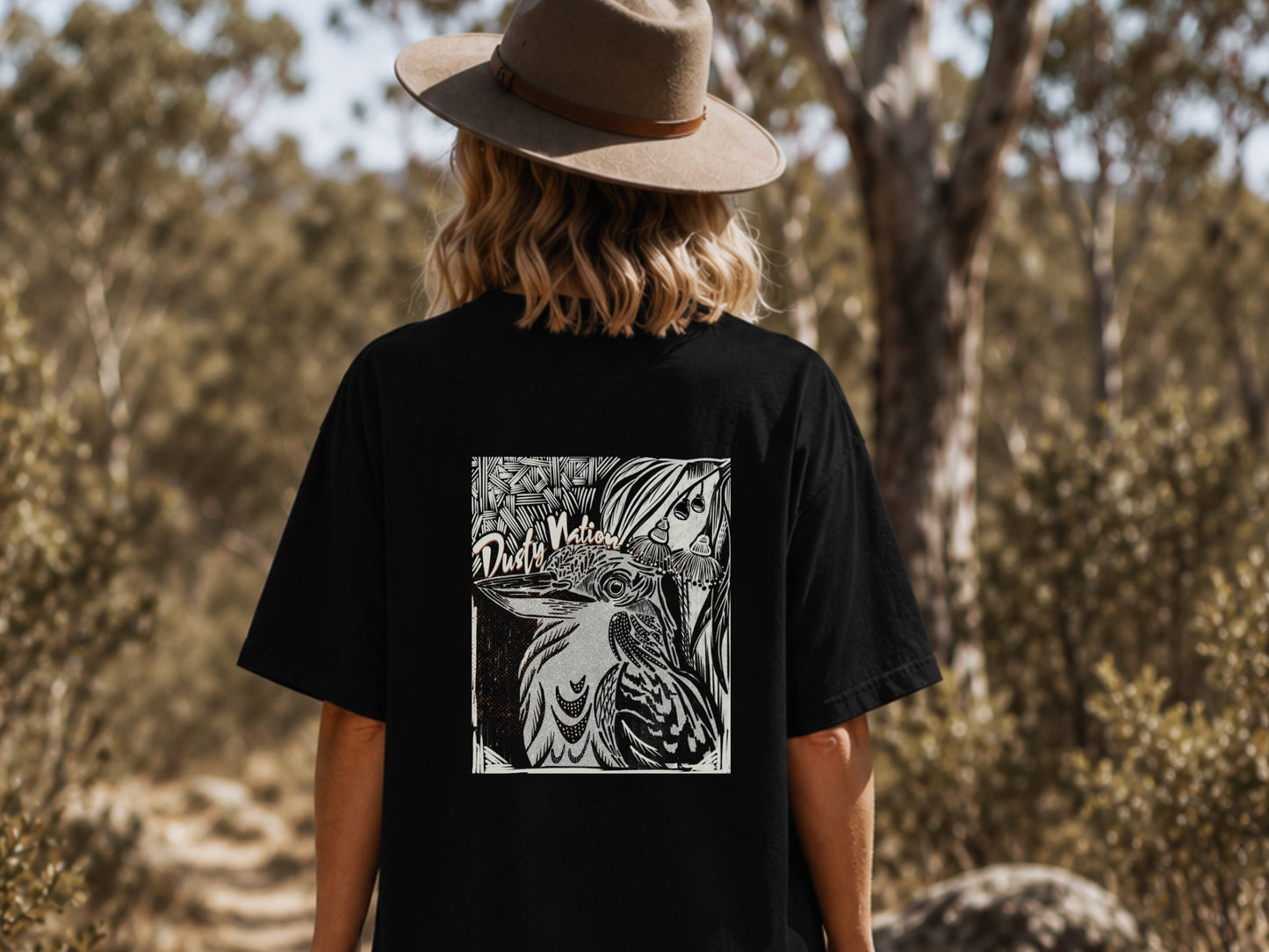 woman wearing a black t shirt with kookaburra print from Dustie Nation store