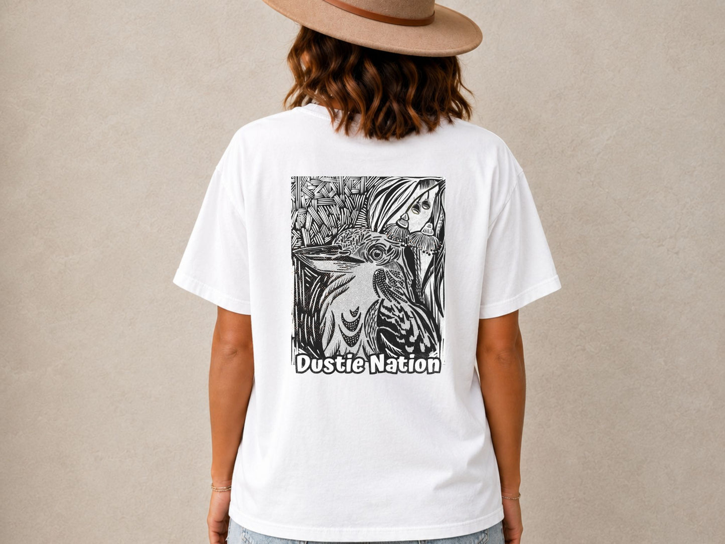 Black and white sketched design of an Australian kookaburra on a oversized t shirt available in black or white